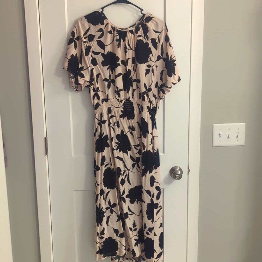 H&M Beige maxi dress with black floral detail and cinched waist